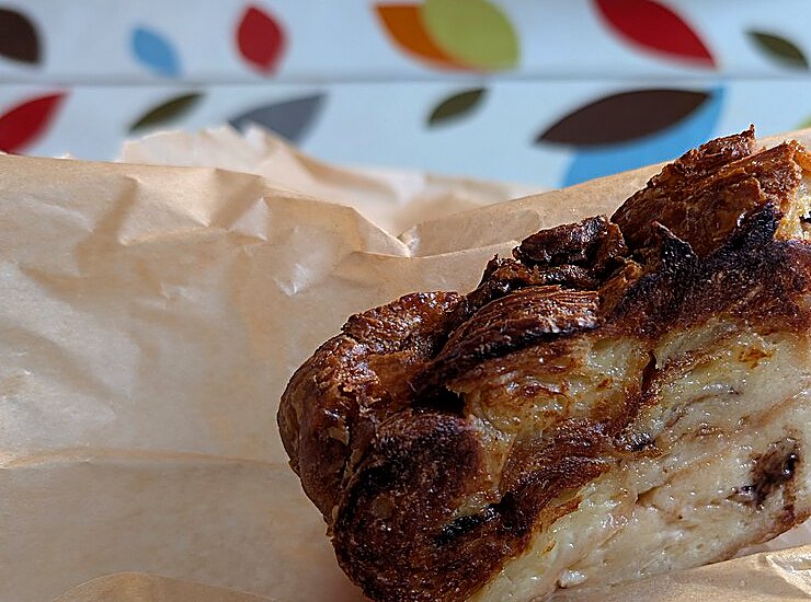 A caramelised slice of croissant bread pudding