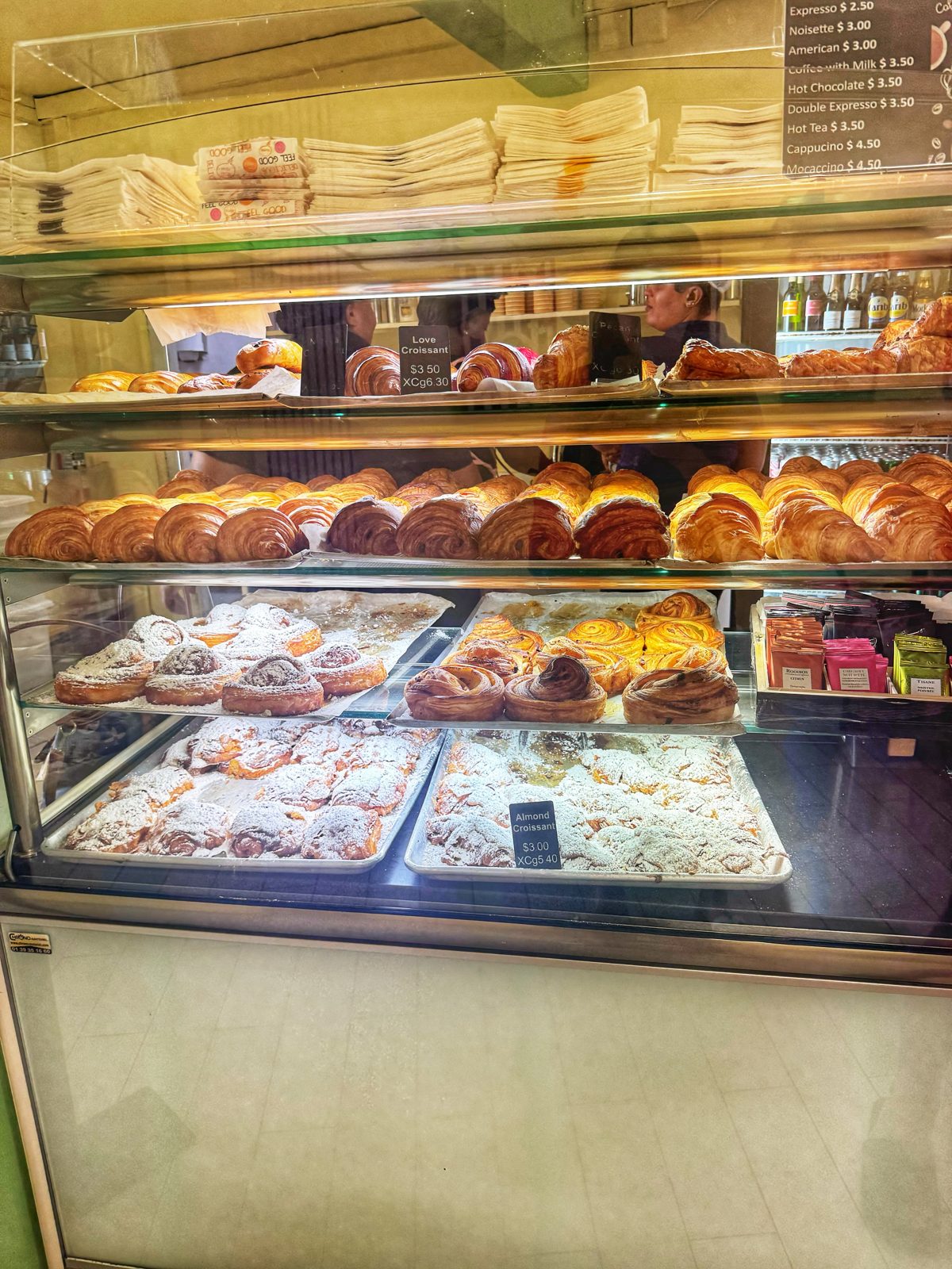 The pastry case at La Sucriere in Sint Maarten, filled with tarts, eclairs and viennoiserie