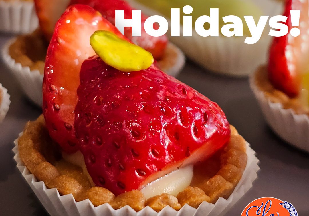 Glazed strawberry tartlets in the La Sucriere pastry case, Sint Maarten